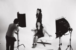 Production shot 1: Two actresses and production staff setting the lighting for the Patient Storm