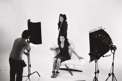 Production shot 1: Two actresses and production staff setting the lighting for the Patient Storm