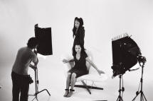 Production shot 1:  Two actresses and production staff setting the lighting for the Patient Storm